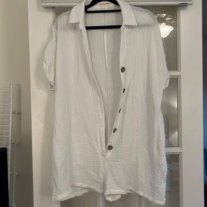 White gauze button front romper.